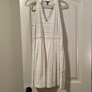 Sleeveless cream flared dress lined. Size X-large